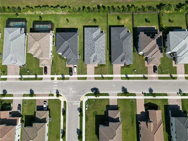 an aerial view of a house with a garden
