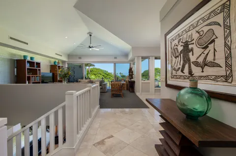 a view of a living room and a window