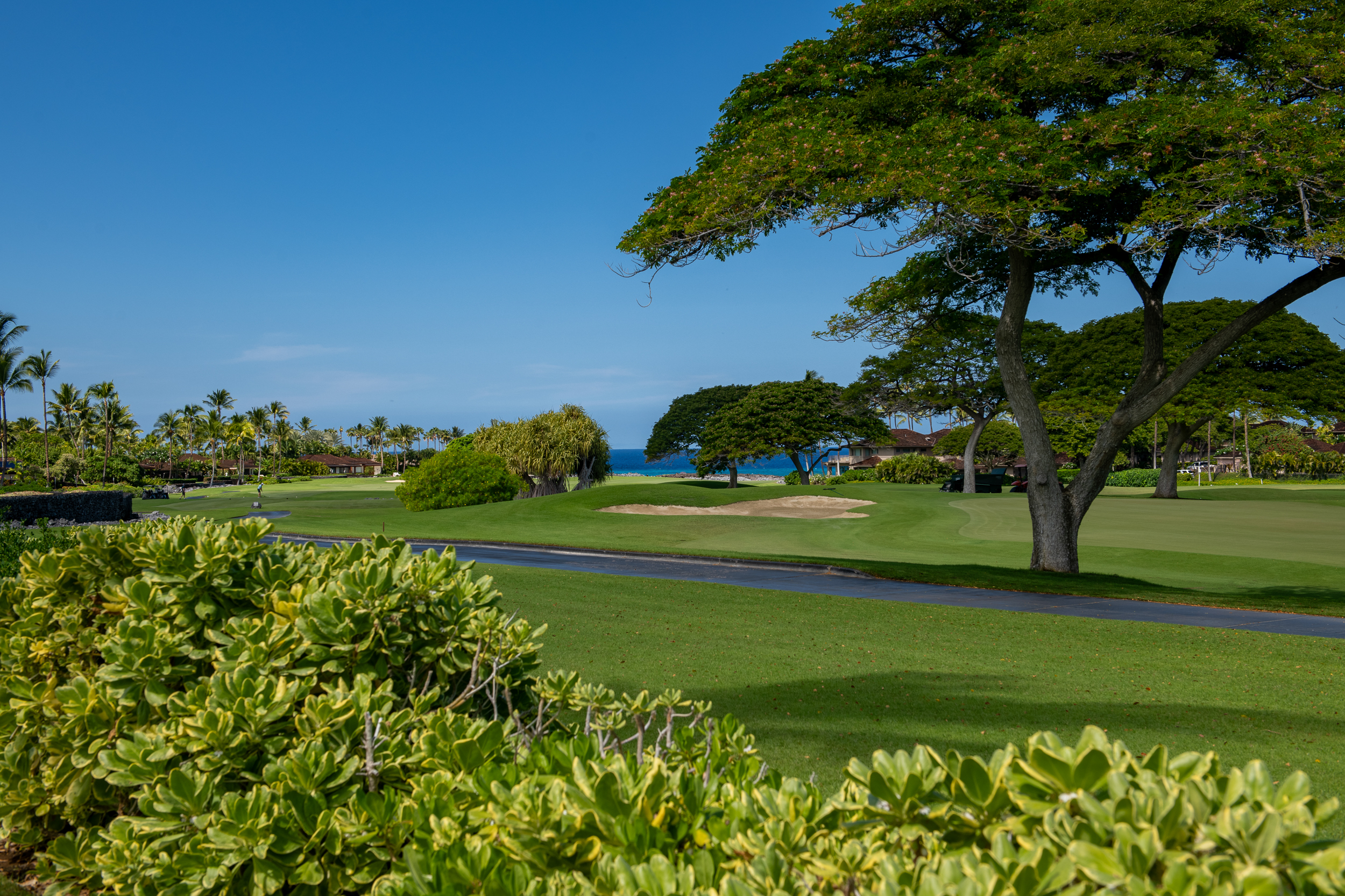 72-140 Waiulu Street, Unit 140B Kailua-Kona, HI 96740 - Photo 14 of 21 a view of a golf course with a lake