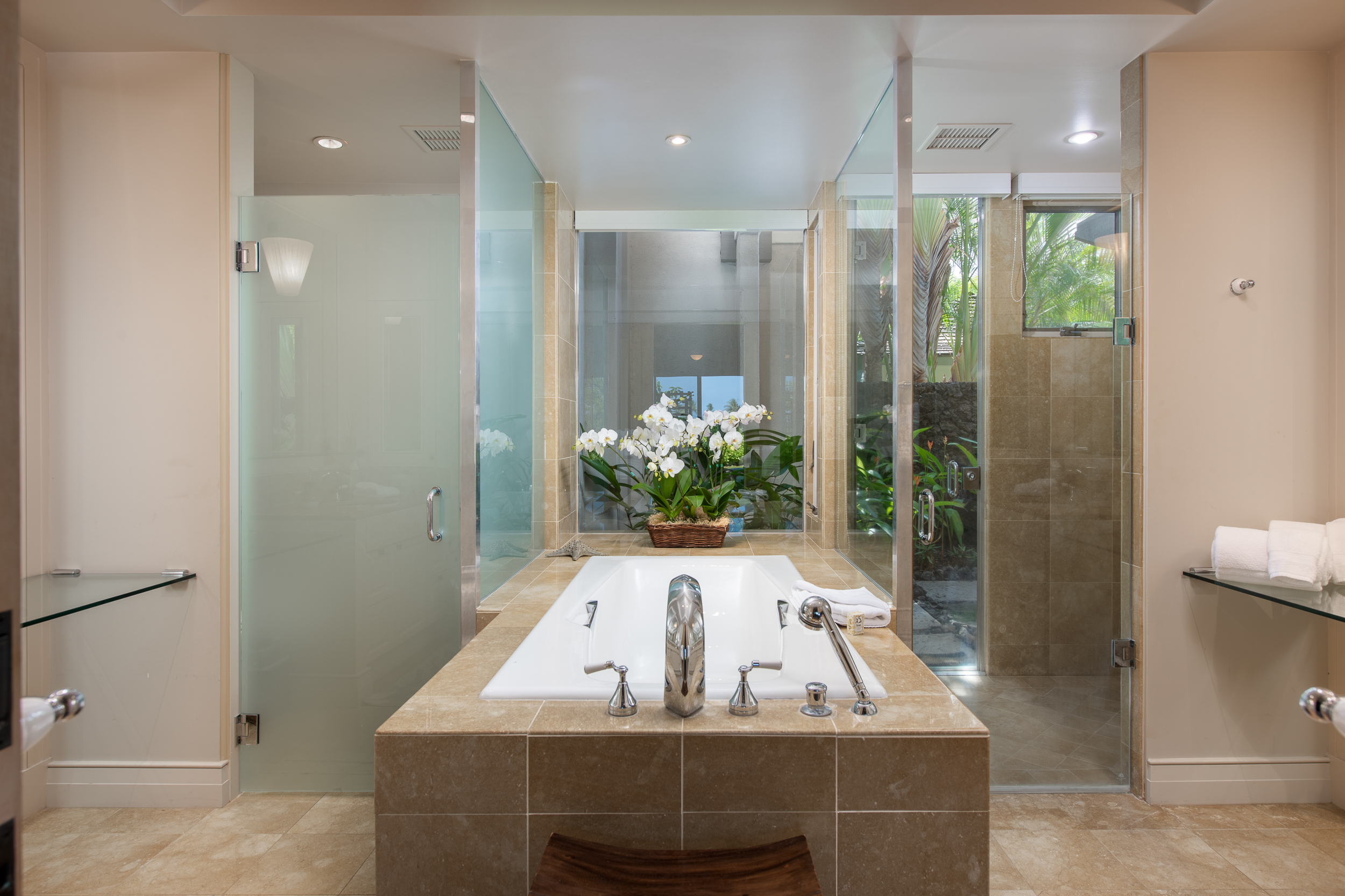 72-140 Waiulu Street, Unit 140B Kailua-Kona, HI 96740 - Photo 17 of 21 a view of a bath tub sitting in a bathroom