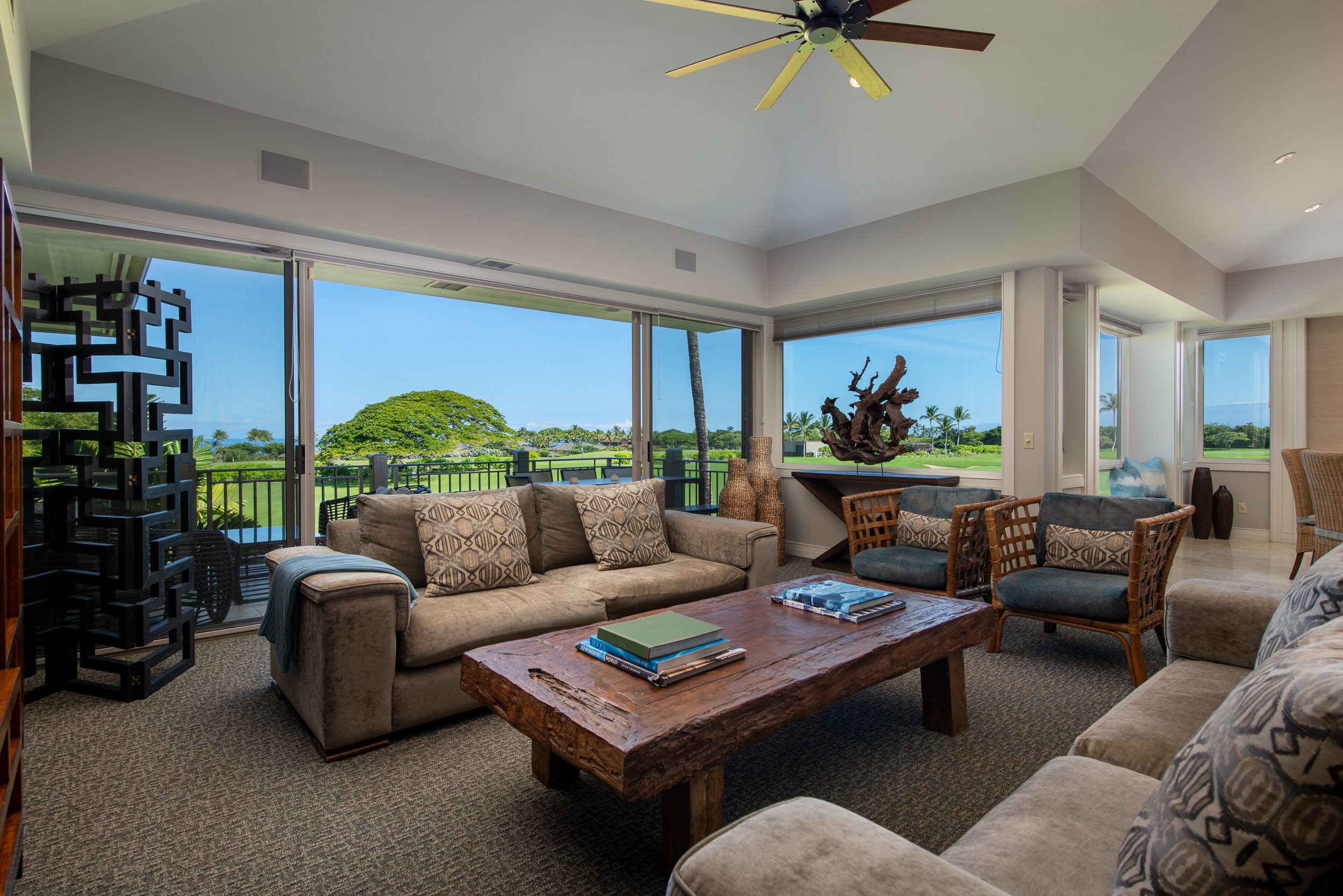 72-140 Waiulu Street, Unit 140B Kailua-Kona, HI 96740 - Photo 4 of 21 a living room with furniture and a large window