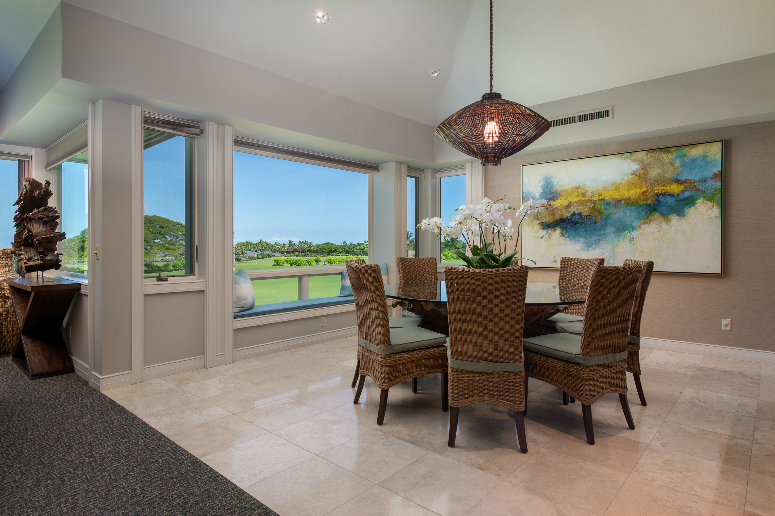 72-140 Waiulu Street, Unit 140B Kailua-Kona, HI 96740 - Photo 6 of 21 a view of a dining room with furniture window and outside view