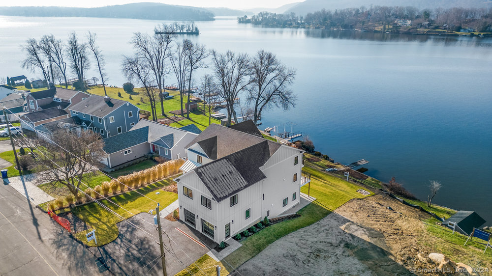 swimming pool with outdoor seating and stairs
