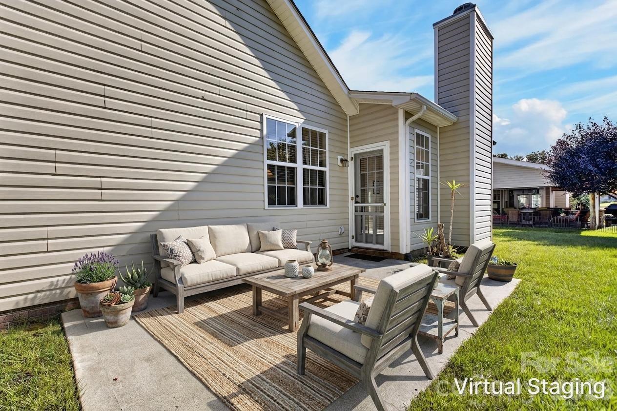 268 Farm Valley Road Fletcher, NC 28732 - Photo 26 of 30 a view of a house with backyard and sitting area
