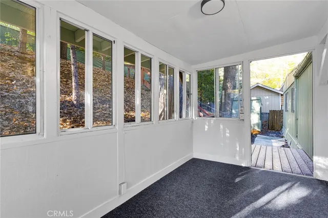 a view of a living room and window