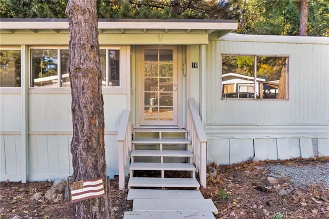 a front view of a house with a porch