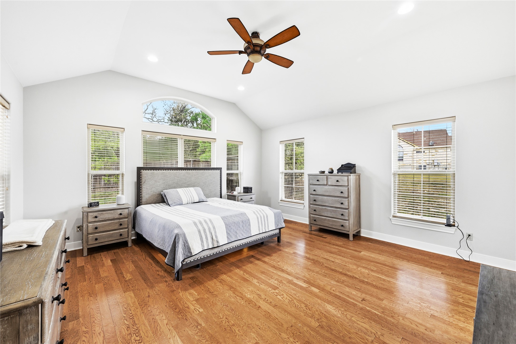 140 Winchester Road Bastrop, TX 78602 - Photo 17 of 36 Bedroom featuring recessed lighting, lofted ceiling, ceiling fan, and light wood-type flooring