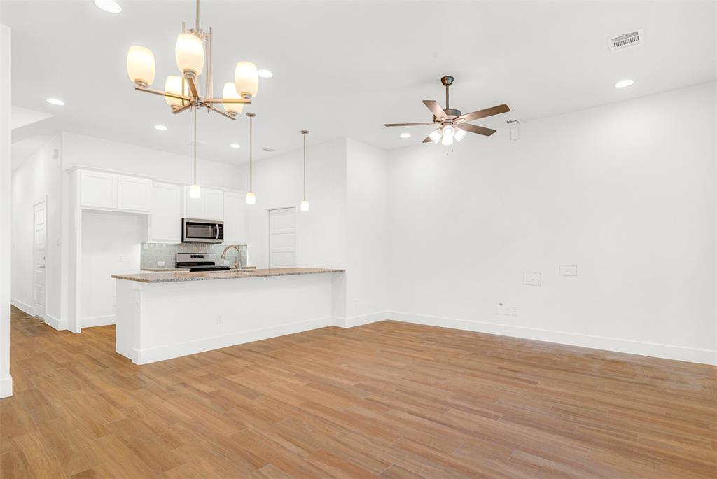 3676 Rickshaw Drive, Unit A Dallas, TX 75229 - Photo 7 of 21 Large counter/eating bar next to pantry