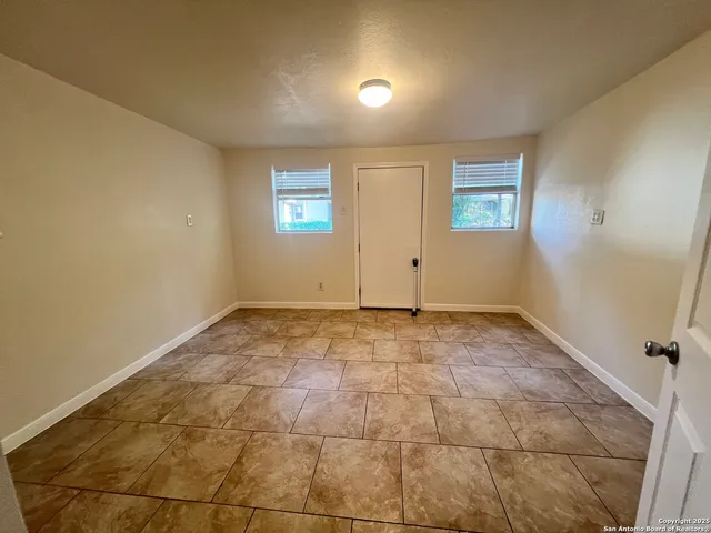 a view of a room with a window