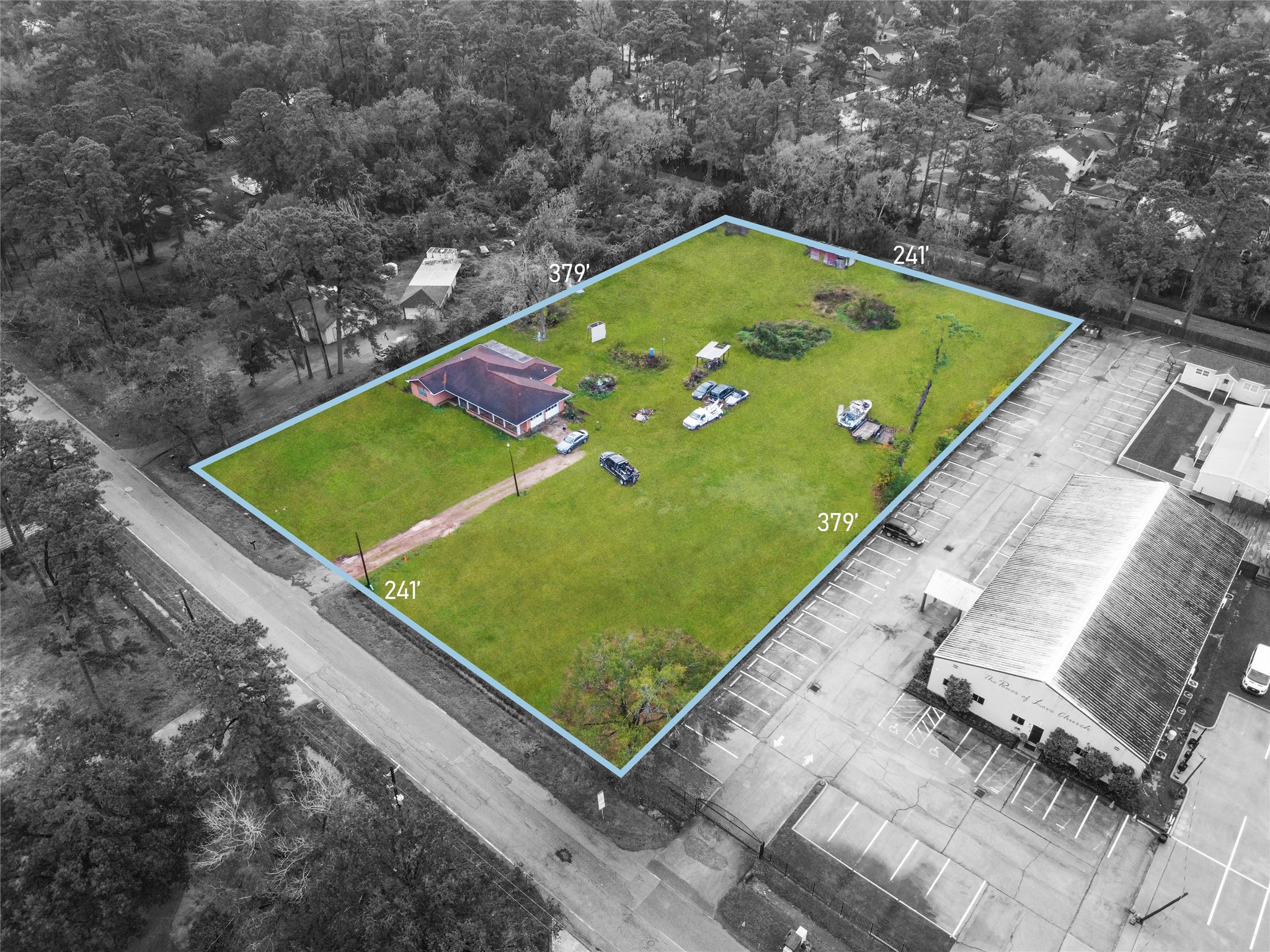 a view of a pool with a backyard