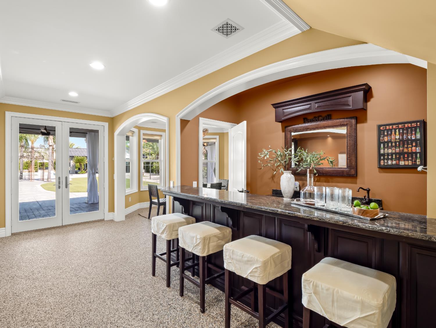 17113 Mark Road Madera, CA 93636 - Photo 15 of 99 a dining hall with stainless steel appliances granite countertop a dining table and chairs