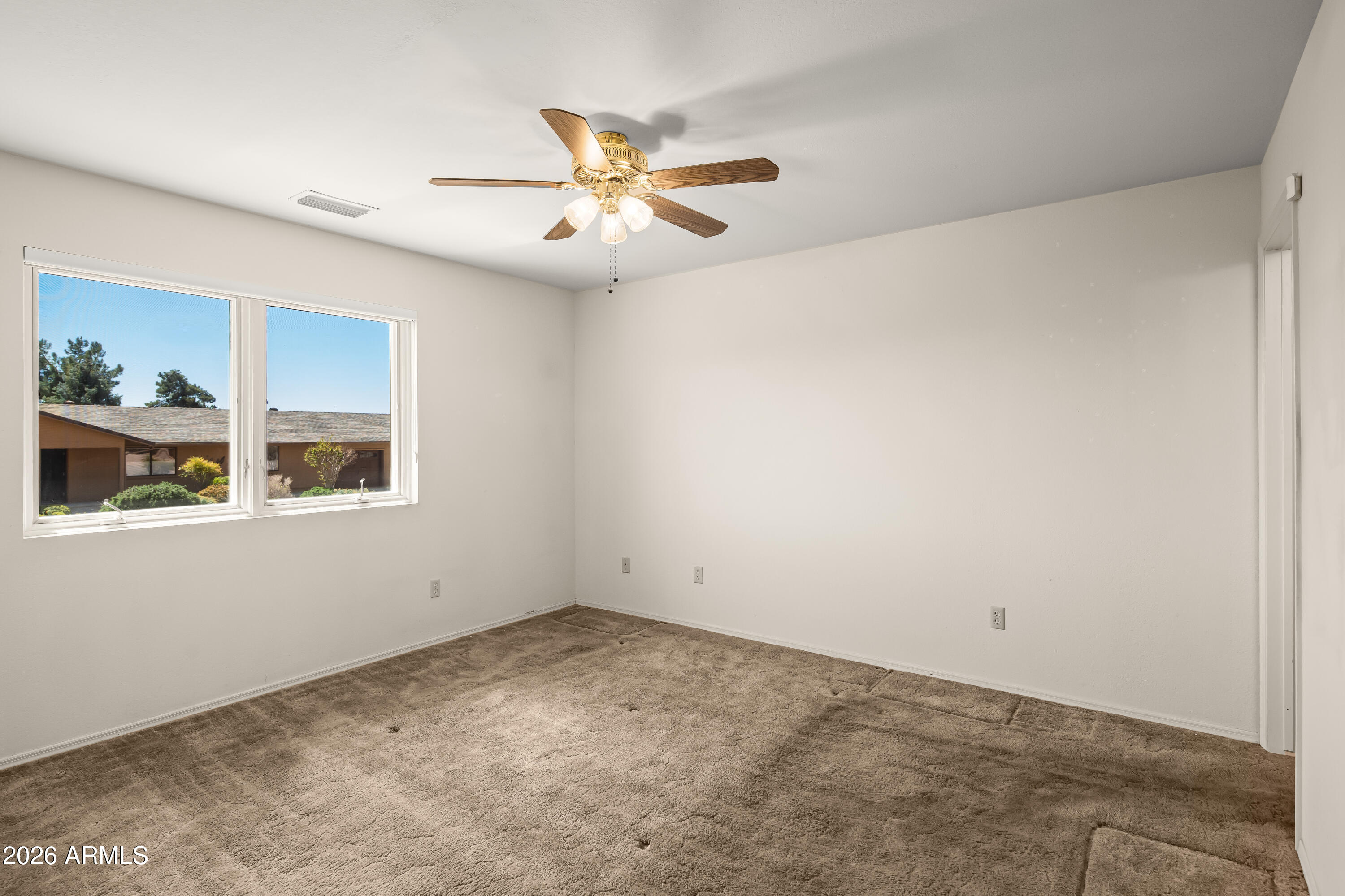 2320 Buckboard Road Sedona, AZ 86336 - Photo 13 of 19 a view of an empty room with a window