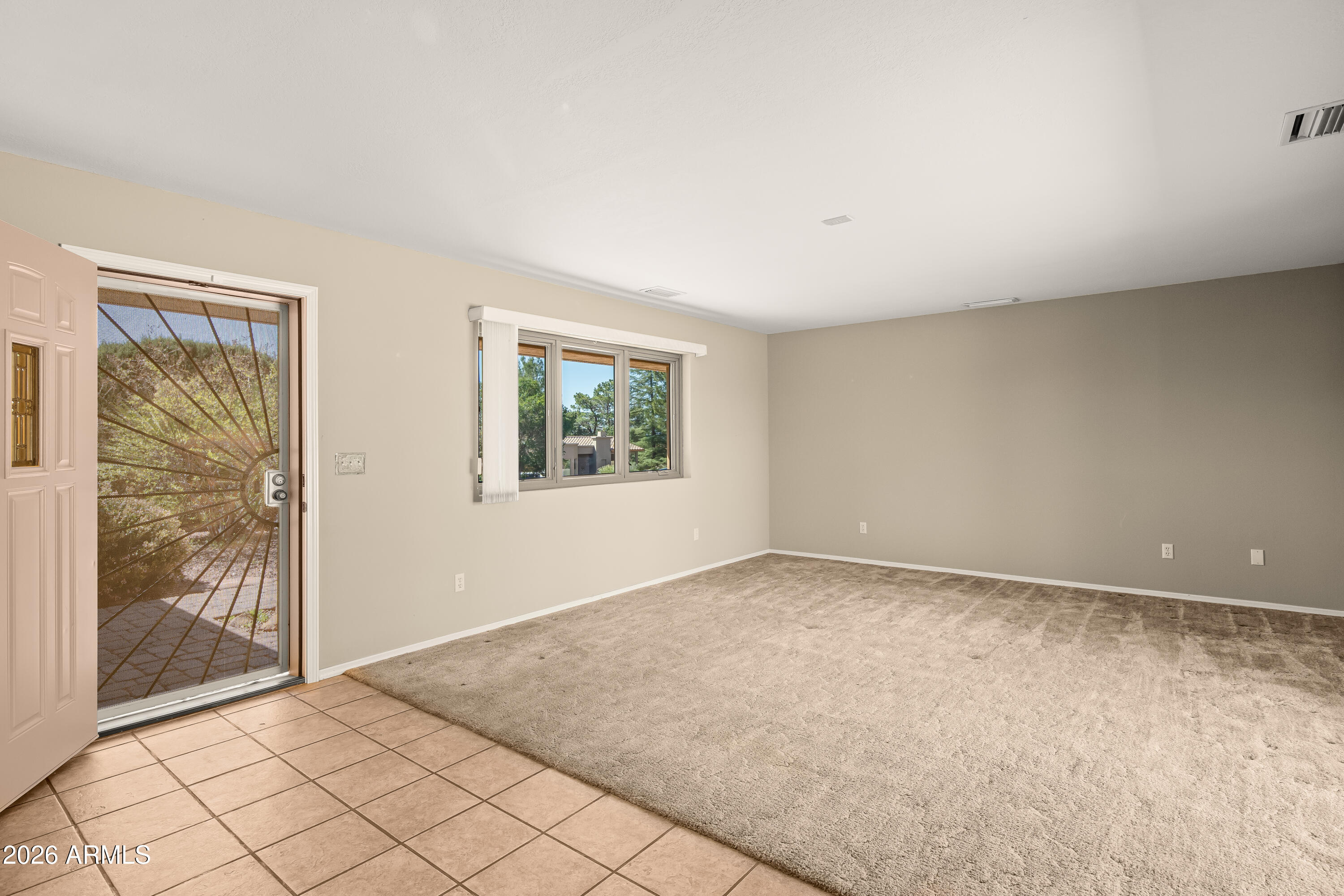 2320 Buckboard Road Sedona, AZ 86336 - Photo 5 of 19 an empty room with windows