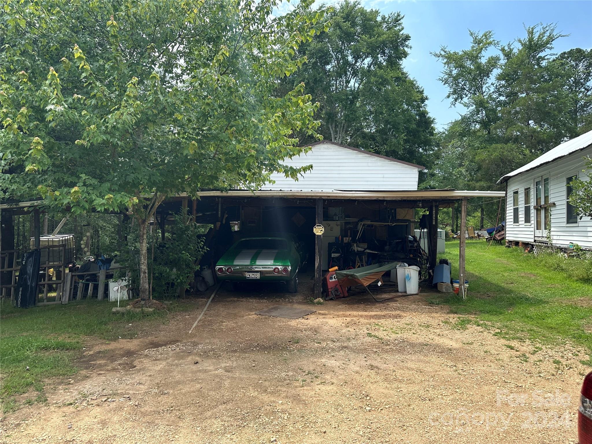 806 Pinckney Road Chester, SC 29706 - Photo 6 of 6 a view of a car park that has parked in it
