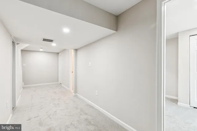 an empty room with an entryway