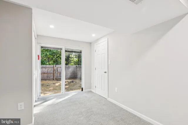 a view of a room with a large window