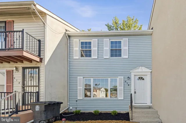 a front view of a house with windows