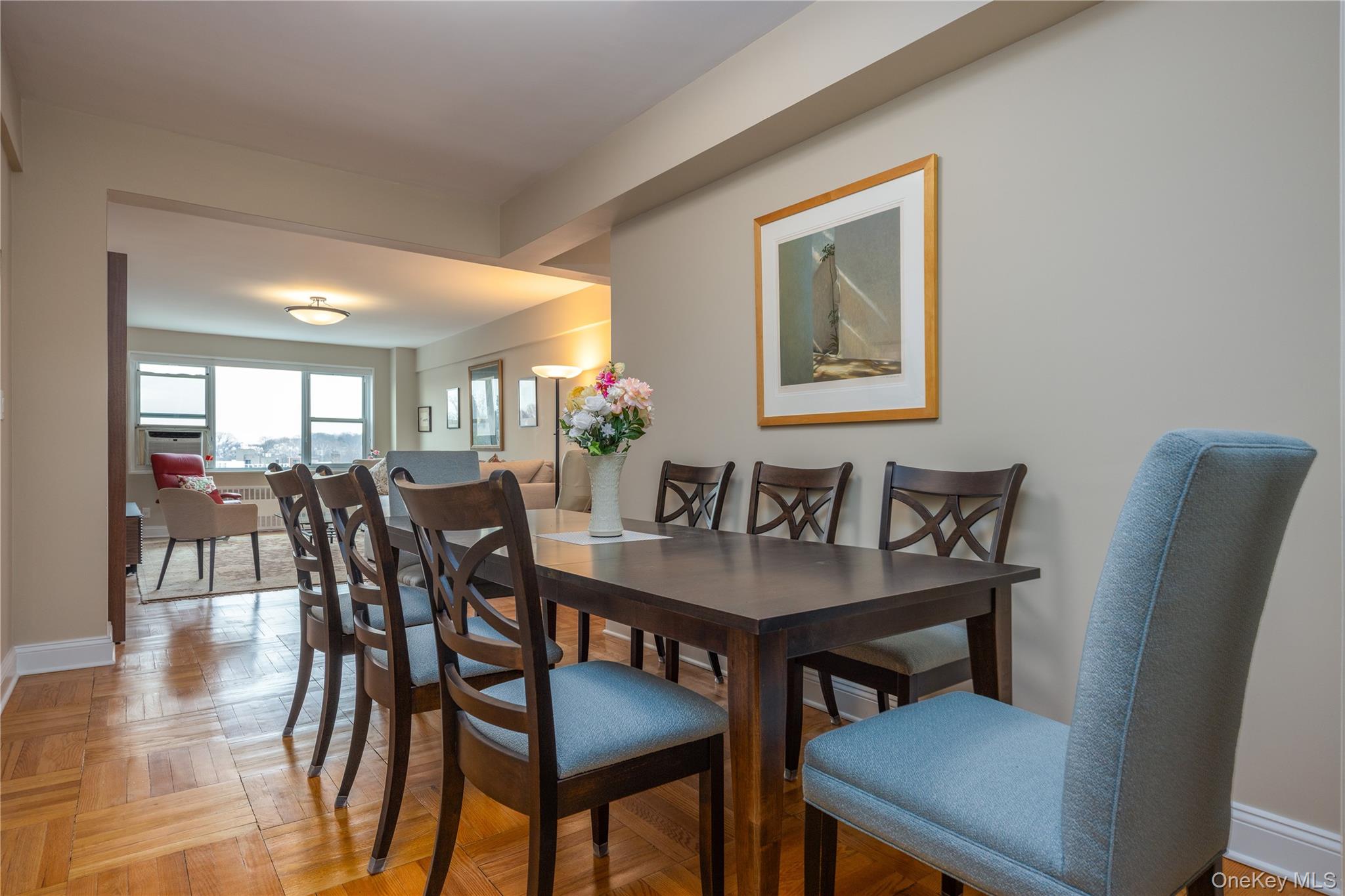 900 Palmer Road, Unit 9J Bronxville, NY 10708 - Photo 5 of 14 a view of a dining room with furniture and wooden floor