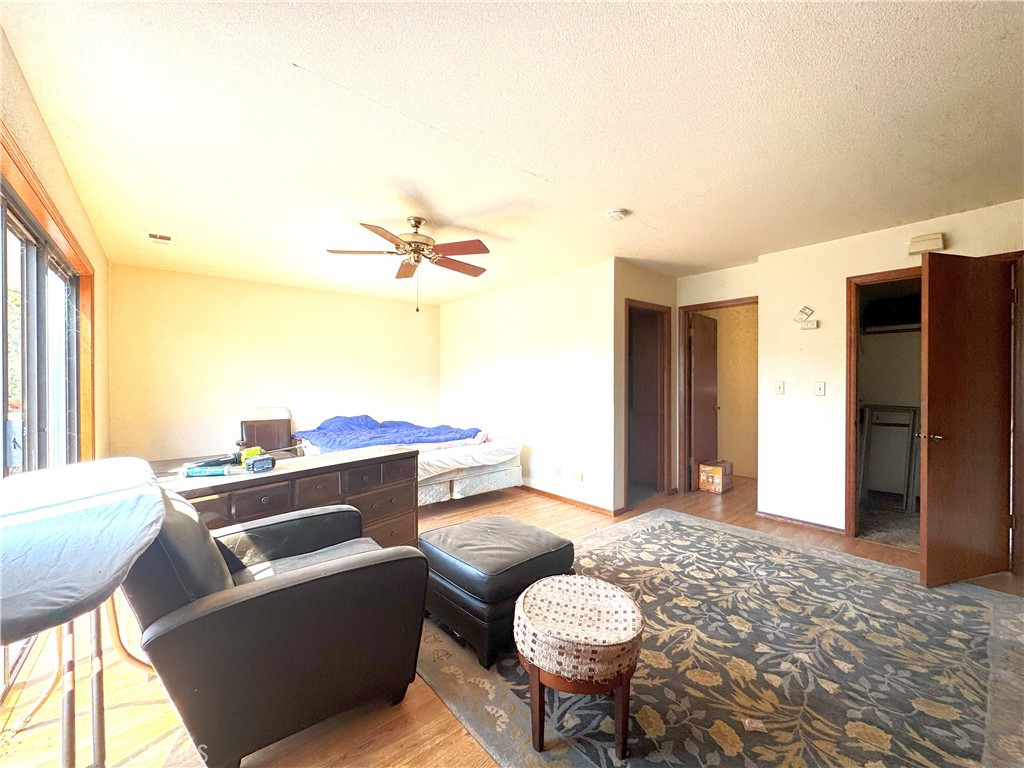 18720 Wingfoot Place Tehachapi, CA 93561 - Photo 13 of 26 a living room with furniture and a rug