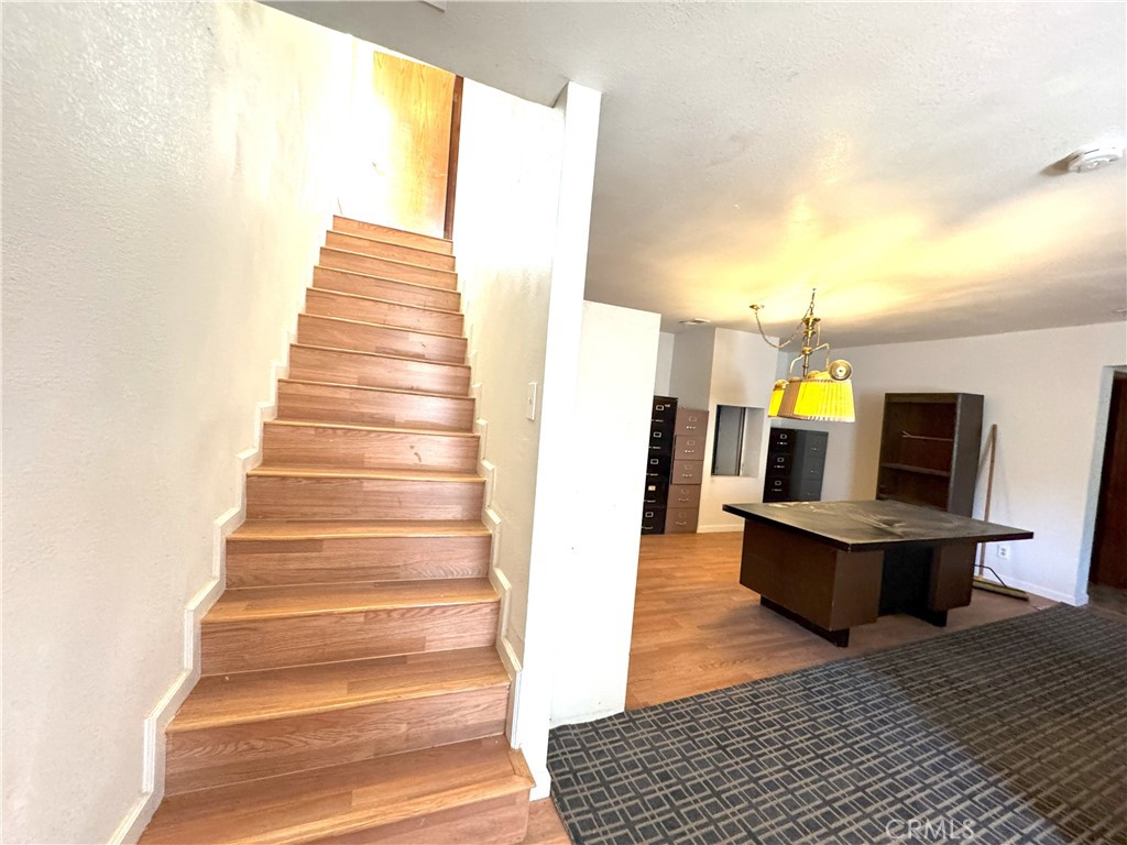 18720 Wingfoot Place Tehachapi, CA 93561 - Photo 25 of 26 a view of kitchen with furniture and wooden floor