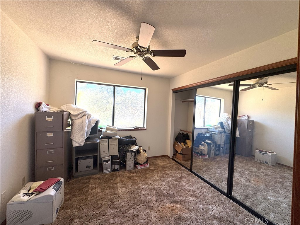 18720 Wingfoot Place Tehachapi, CA 93561 - Photo 10 of 26 a view of workspace with furniture and window