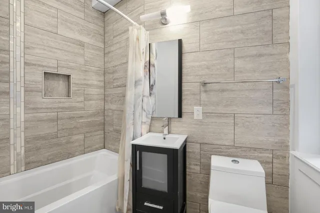 a bathroom with a sink and a bathtub