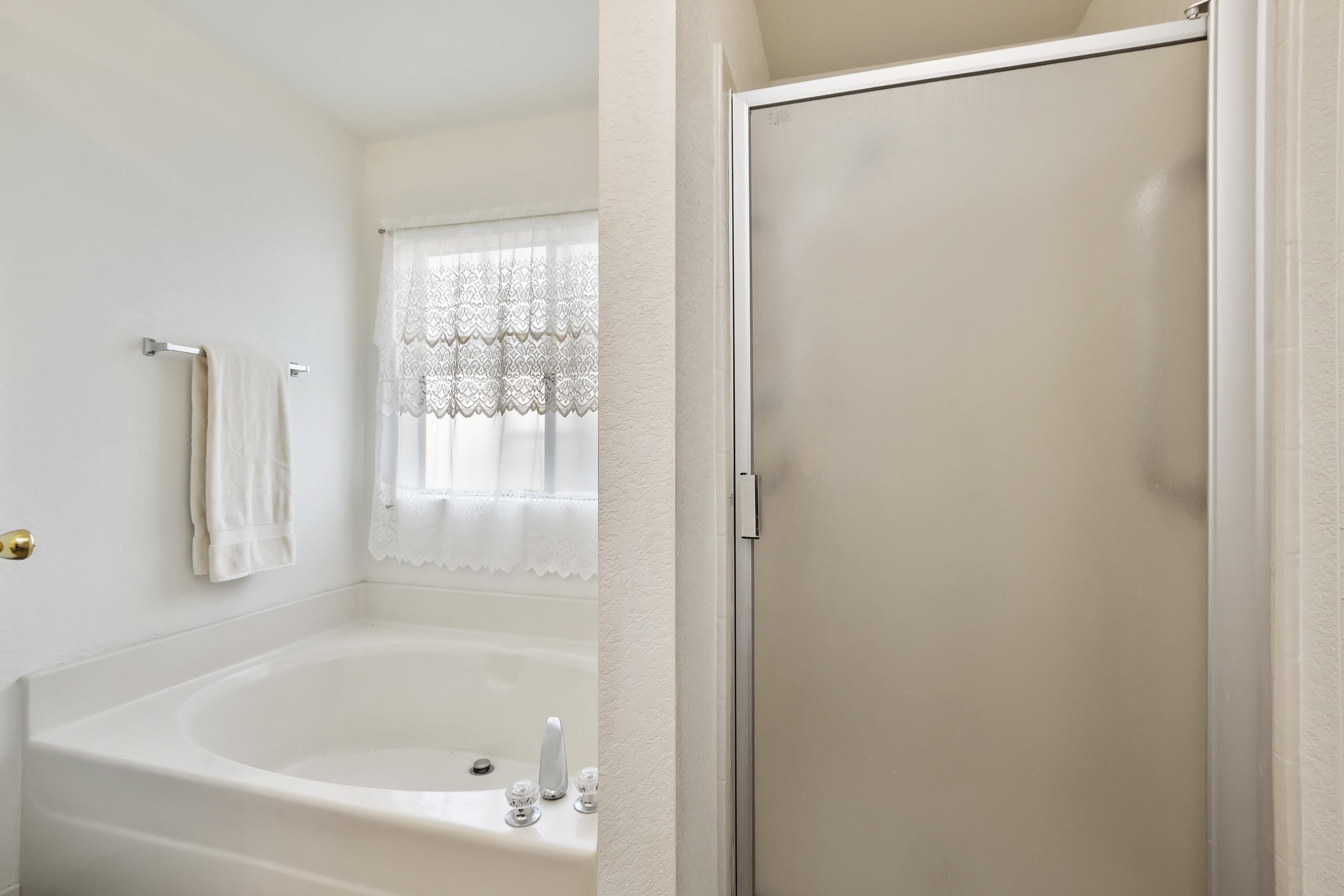 74711 Dillon Road, Unit 585 Desert Hot Springs, CA 92241 - Photo 32 of 60 a close up of a bathtub in a bathroom