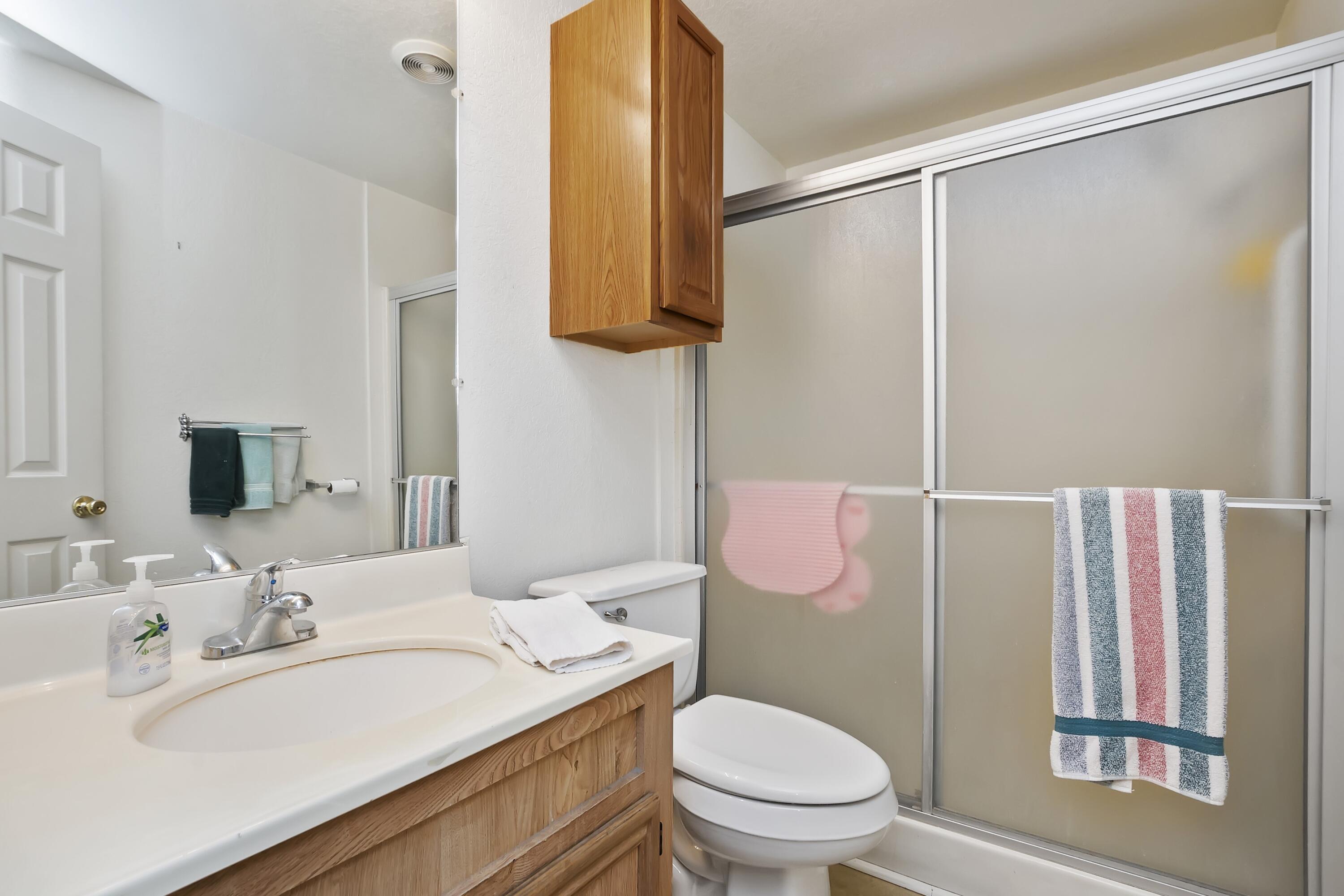 74711 Dillon Road, Unit 585 Desert Hot Springs, CA 92241 - Photo 35 of 60 a bathroom with a sink toilet and shower