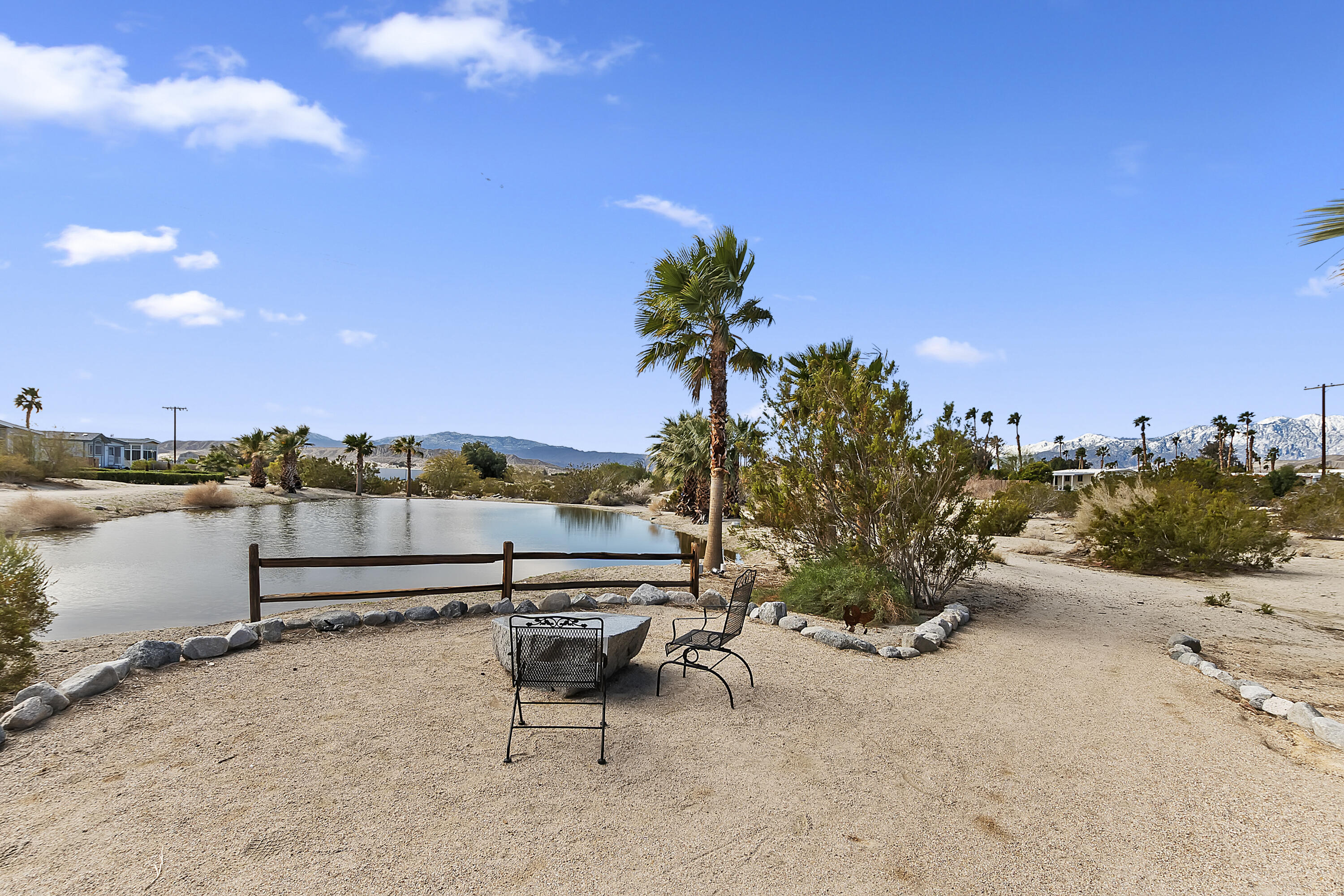 74711 Dillon Road, Unit 585 Desert Hot Springs, CA 92241 - Photo 57 of 60 a view of a terrace with chairs