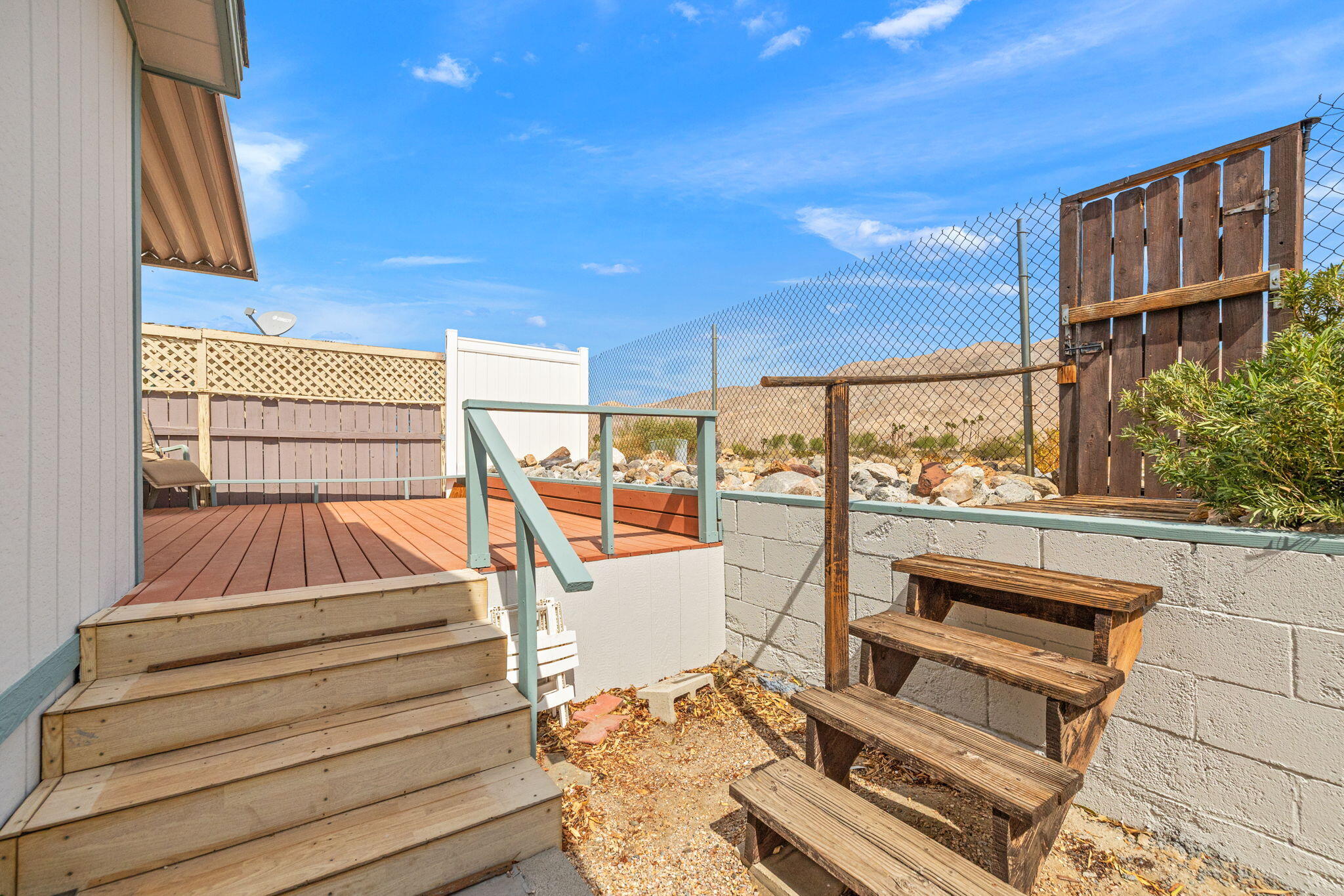 74711 Dillon Road, Unit 585 Desert Hot Springs, CA 92241 - Photo 10 of 60 a view of staircase with a rug