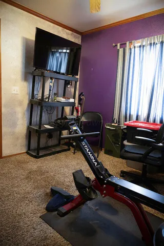 a view of small space with racks on the wall