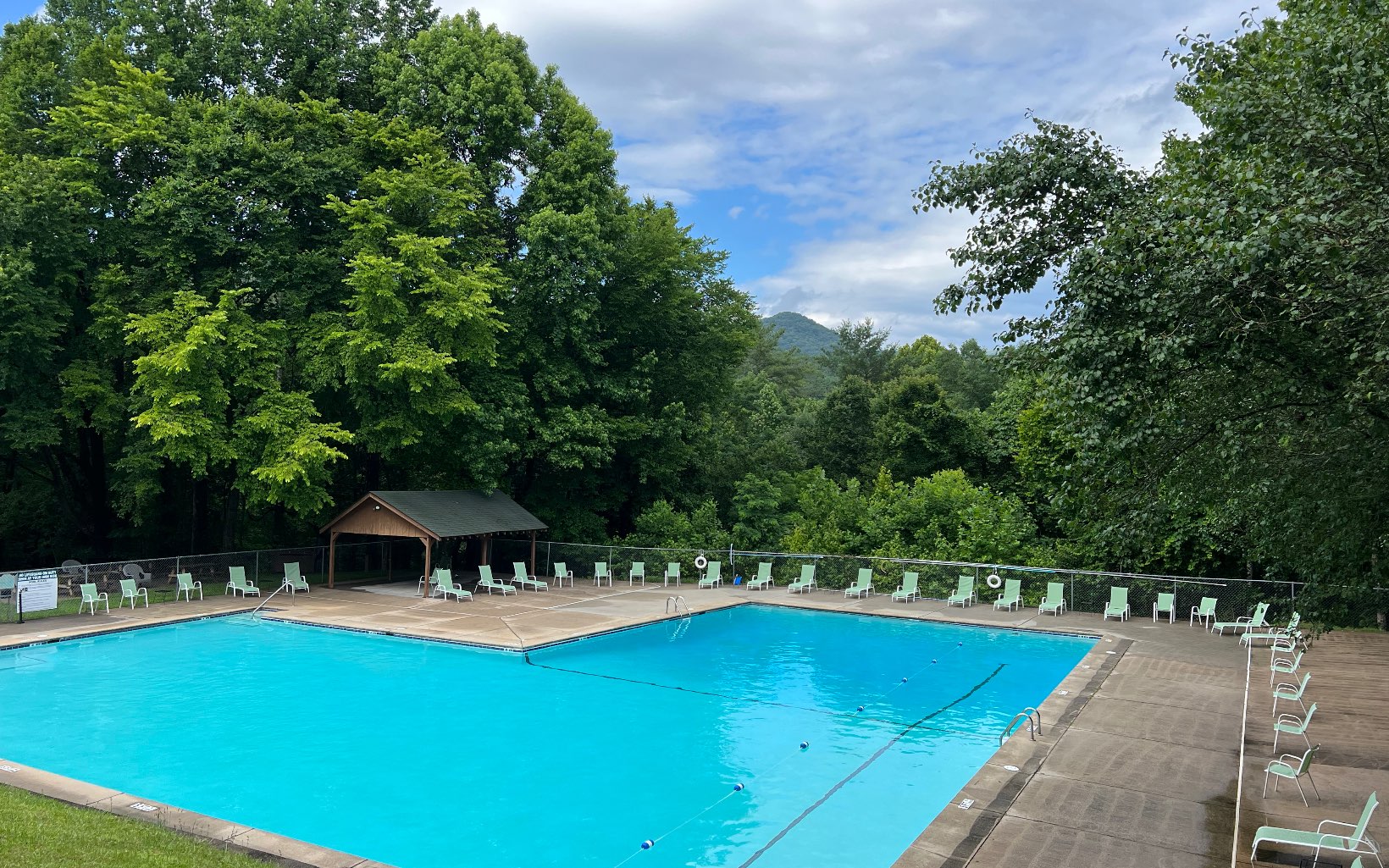 J-214 Walnut Mountain Road Ellijay, GA 30536 - Photo 15 of 23 a view of a swimming pool with a patio