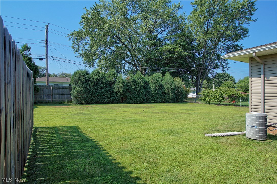 8601 Royal Ridge Drive Parma, OH 44129 - Photo 32 of 33 Level back yard with trees.