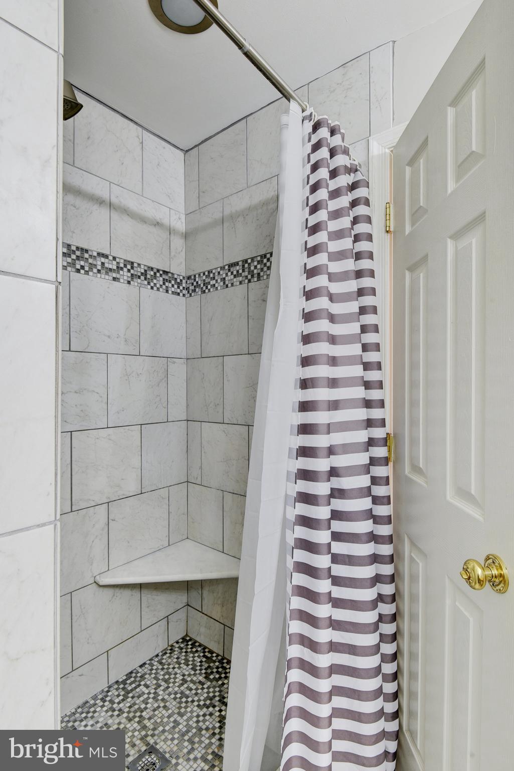 13017 Bath Gate Way Bristow, VA 20136 - Photo 23 of 35 a bathroom with a shower