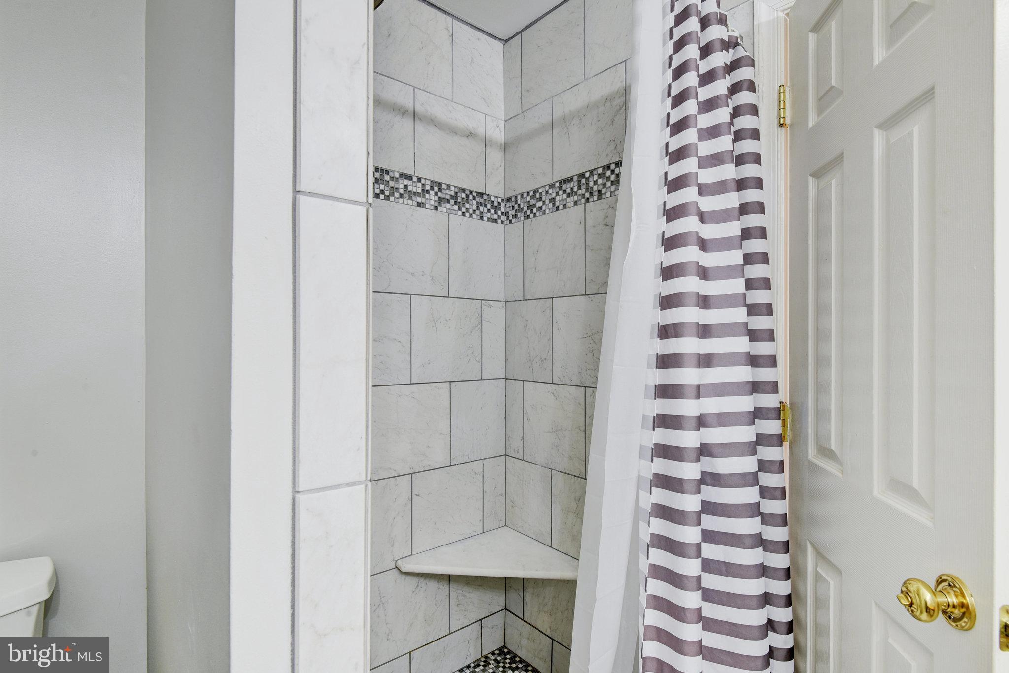 13017 Bath Gate Way Bristow, VA 20136 - Photo 24 of 35 a bathroom with a shower