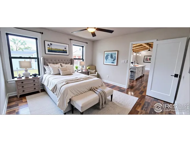 a bedroom with a bed and a mirror