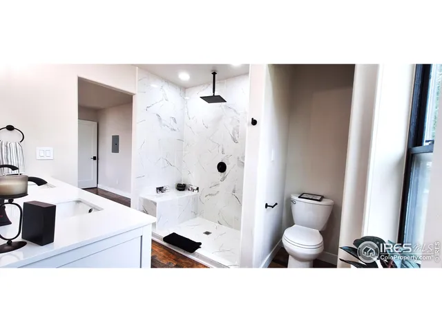 a bathroom with a sink toilet a shower and bathtub