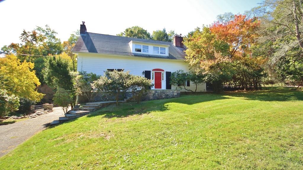 2 Woodmill Road Chappaqua, NY 10514 - Photo 1 of 1 a view of a house with a yard