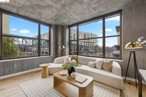 a bedroom with a bed and glass window