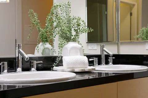 a room with a large window and couch