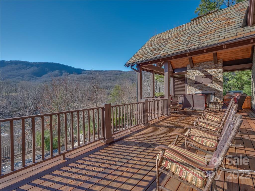538 Chestertown Drive Mill Spring, NC 28756 - Photo 21 of 46 a view of balcony with wooden floor and outdoor seating