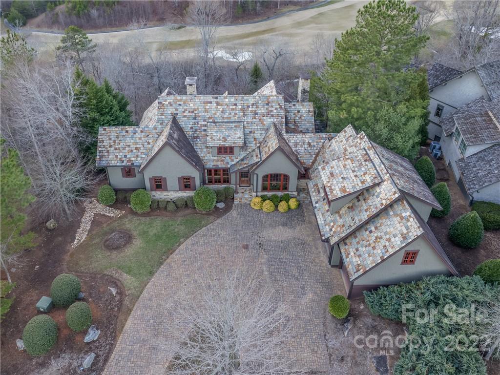 538 Chestertown Drive Mill Spring, NC 28756 - Photo 3 of 46 a front view of a house with garden