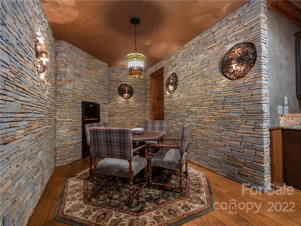 538 Chestertown Drive Mill Spring, NC 28756 - Photo 33 of 46 a brick house with table chair and chairs