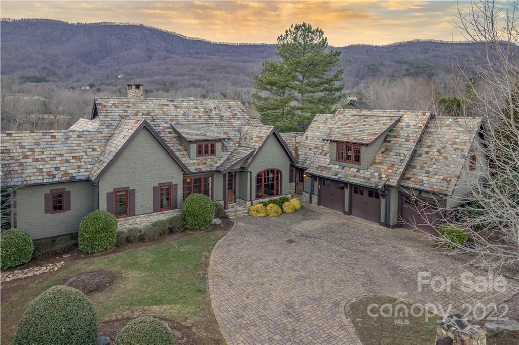 538 Chestertown Drive Mill Spring, NC 28756 - Photo 4 of 46 a view of multiple house with a yard and large tree
