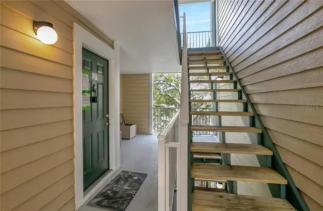 a view of entryway with a front door
