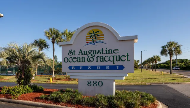 a view of sign board with a yard