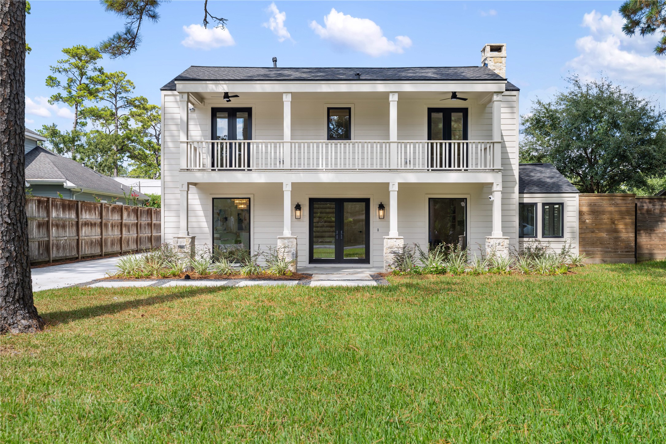 814 Azalea Street Houston, TX 77018 - Photo 25 of 25 a front view of a house with a yard