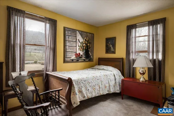 a bedroom with a bed and furniture