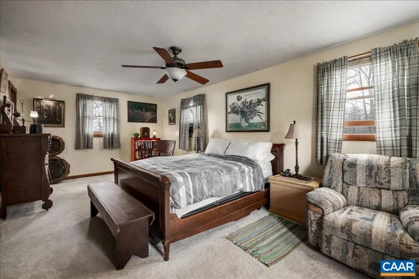 a bathroom with a shower and toilet