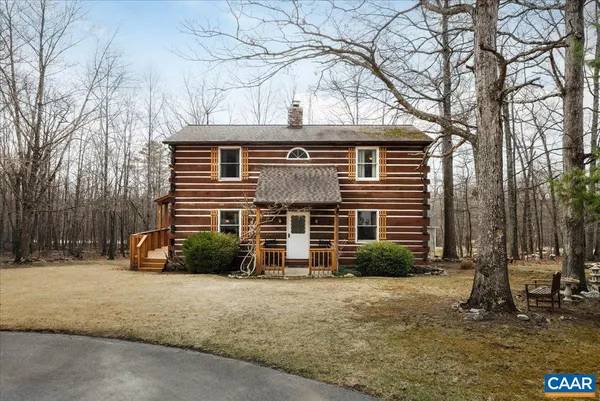 a front view of a house with garage
